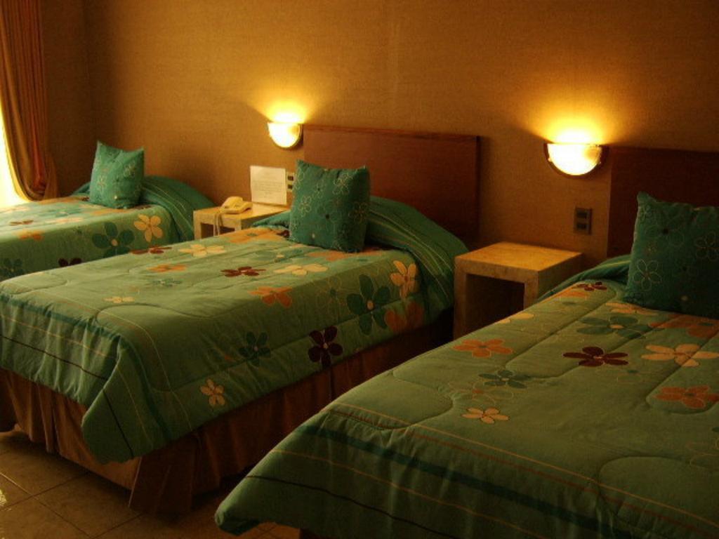 Hotel Costa Pacifico Arica Habitación foto